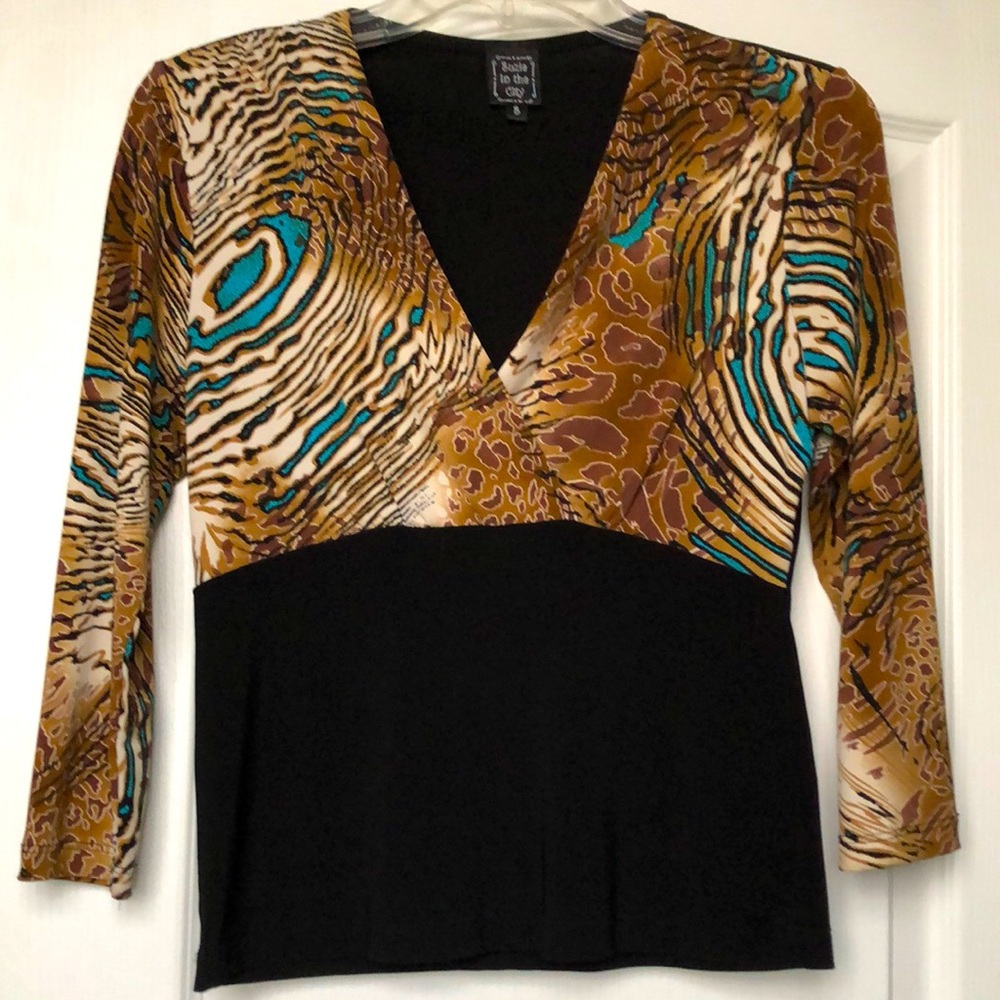Animal print top. Colorblocking with black. Size S. Polyester spandex